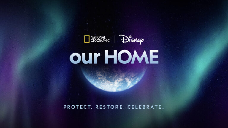 A dark blue night sky with green and purple aurora borealis streaking across the image create the background. In the middle center are the words “our HOME” in large light blue text, underneath the National Geographic and Disney logos. The text sits on top of a gradient image of the lower half of the globe. Smaller light blue text at the bottom of the image reads “PROTECT. RESTORE. CELEBRATE.”